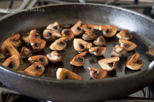 Coolking mushrooms in a fry pan