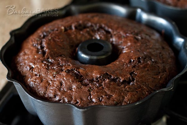 Rich, moist chocolate chocolate chip zucchini bread with tart dried cherries dressed up as a bundt cake. My favorite way to eat zucchini. | BarbaraBakes.com