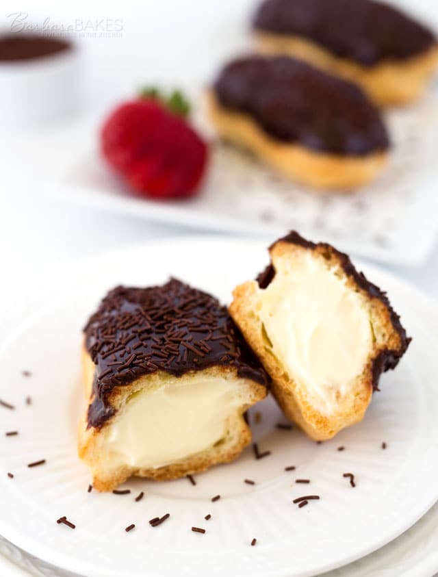 Traditional Chocolate Eclair frosted with a fudgy chocolate ice and decorated with chocolate sprinkles.