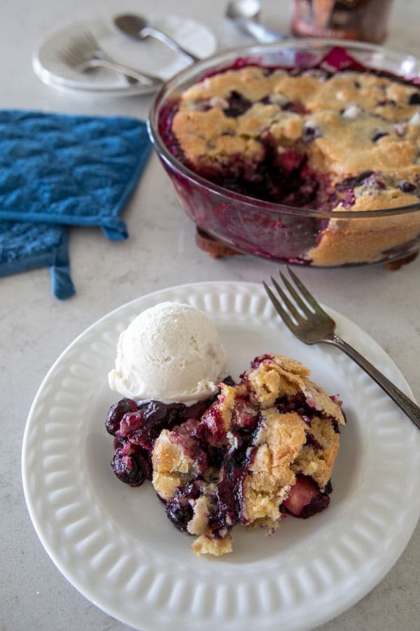 This&nbsp;Apple Blueberry Brown Butter Bliss is a cross between a fruit cobbler and a cake. The sugar sprinkled on top before baking gives it a nice crunch and is the perfect addition to this old fashioned dessert.