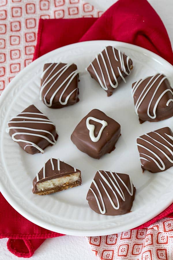 Cheesecake with a layer of caramel over a graham cracker crust wrapped in luscious chocolate. These&nbsp;Chocolate Caramel Cheesecake Bites are a perfect, irresistible Valentine's treat for your sweetheart.
