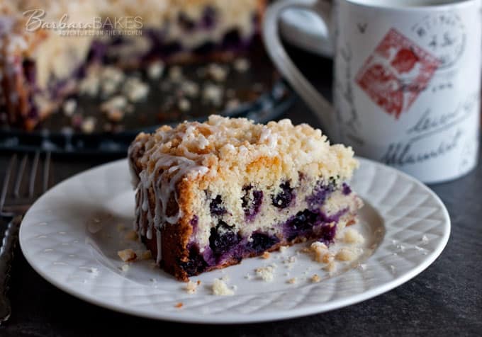 a plated slice of lemon blueberry coffee cake