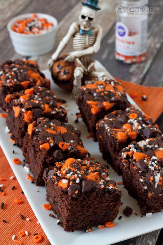 fudgy chocolate brownies topped with Halloween themed sprinkles and chocolate chips