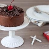 Featured Image for post Cherry Chocolate Cake for Two on a white cake stand