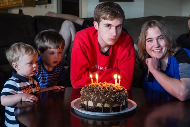 Kids around 19th Birthday Cake