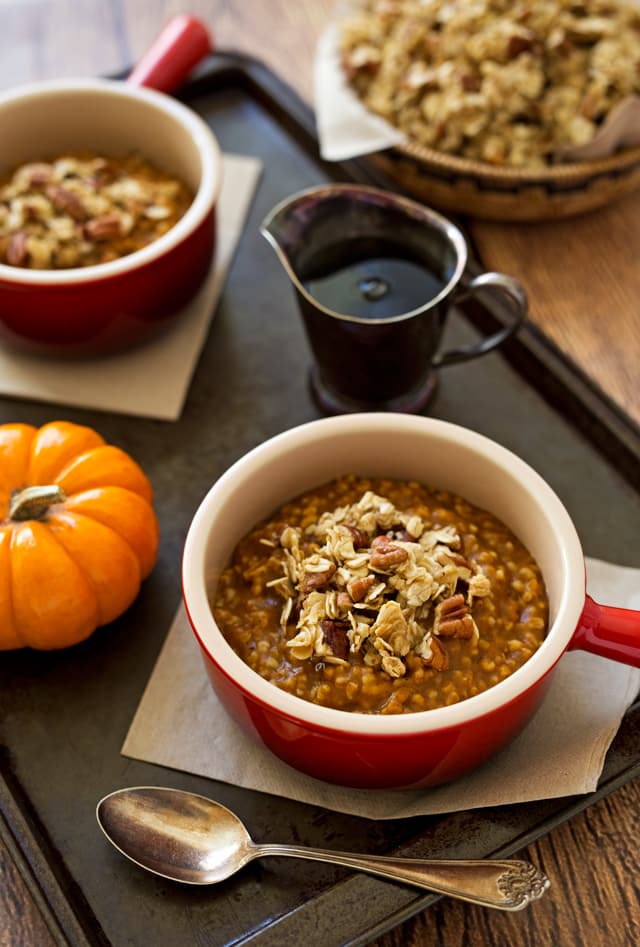 Pressure Cooker Pumpkin Steel Cut Oats with Pecan Pie Granola in a red bowl