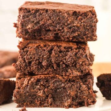fudge brownies cut and in a stack