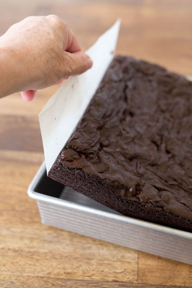 Use parchment paper to easily remove the brownies from the pan. 