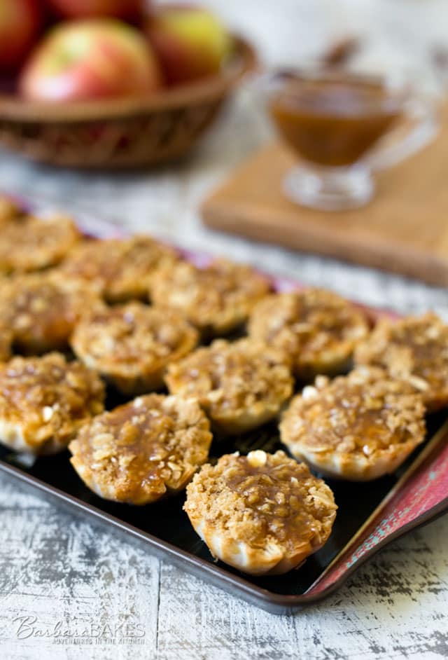 These Dutch Caramel Apple Pie Bites are a fun, bite-size version of a Dutch apple pie in a flaky, ready-made mini shell with a caramel drizzle on top. 