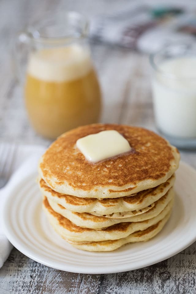 Melt-In-Your-Mouth Buttermilk Pancakes with Buttermilk Syrup that is rich, sweet and buttery. A delicious, sweet way to start the day.