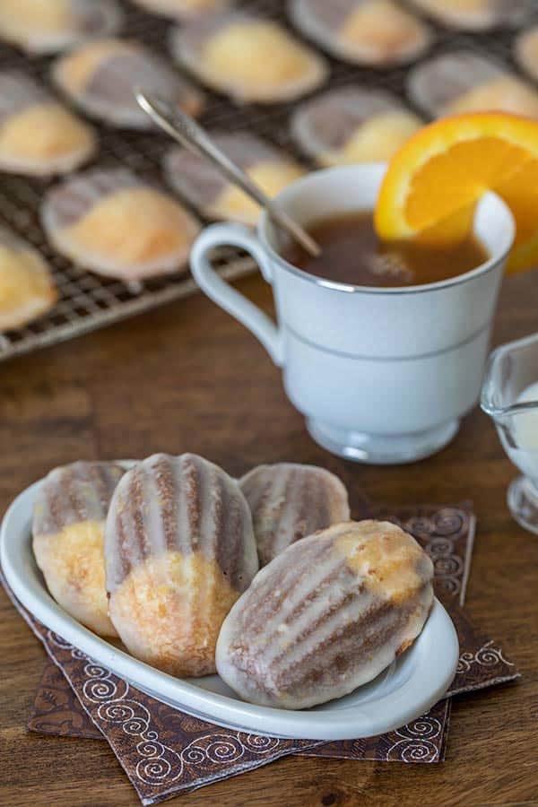 My family loves the extra sweetness and burst of flavor the glaze adds to the madeleines.