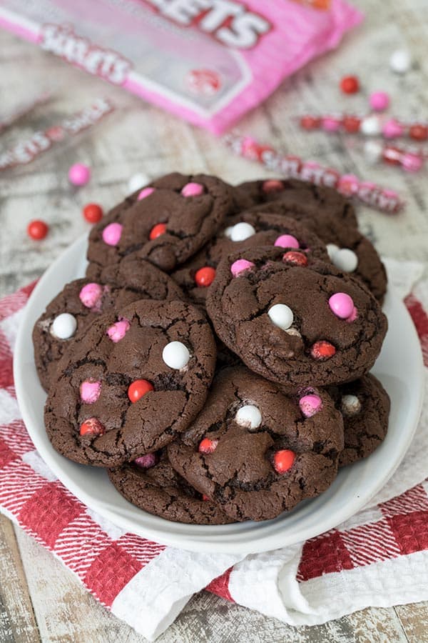 Fudgy Chocolate Sixlets Cookies studded with colorful red, pink and white Sixlets candies. 