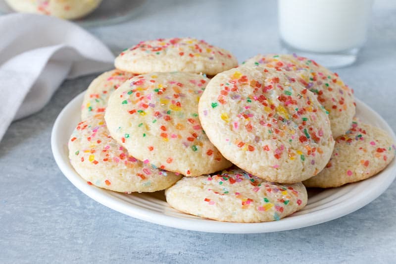 These Lemon Sour Cream Drop Cookies are a tender, cakey, not-too-sweet cookie topped with colorful sprinkles that kids and adults will both love.