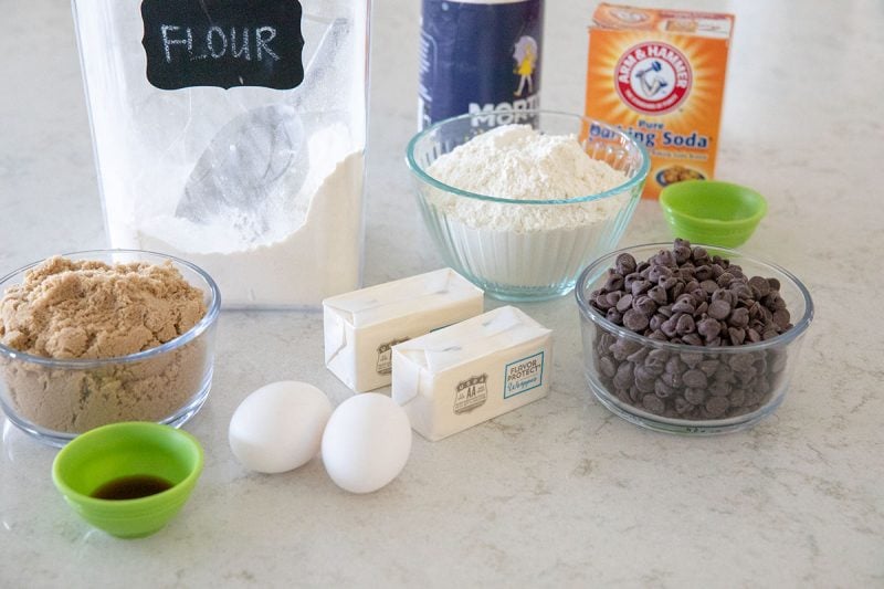 Ingredients for making thick and chewy chocolate chip cookies.