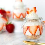Strawberry cheesecake in a pretty tulip shaped jar with a hinged lid.