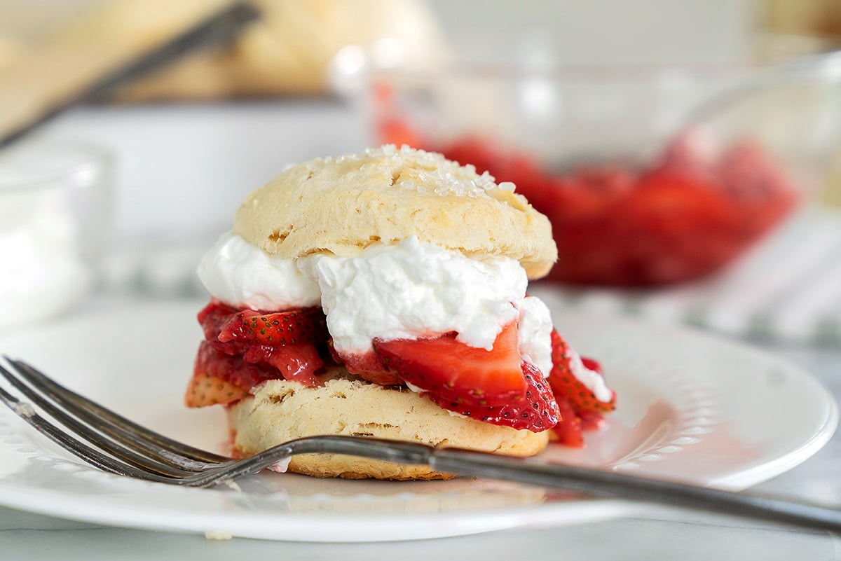 strawberry shortcakes with whipped cream and homemade biscuits