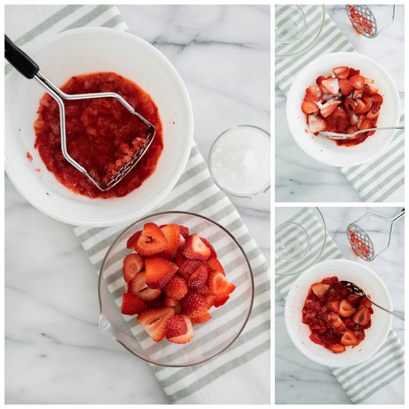 mascerating strawberries for classic strawberry shortcake in two bowls with a potato masher
