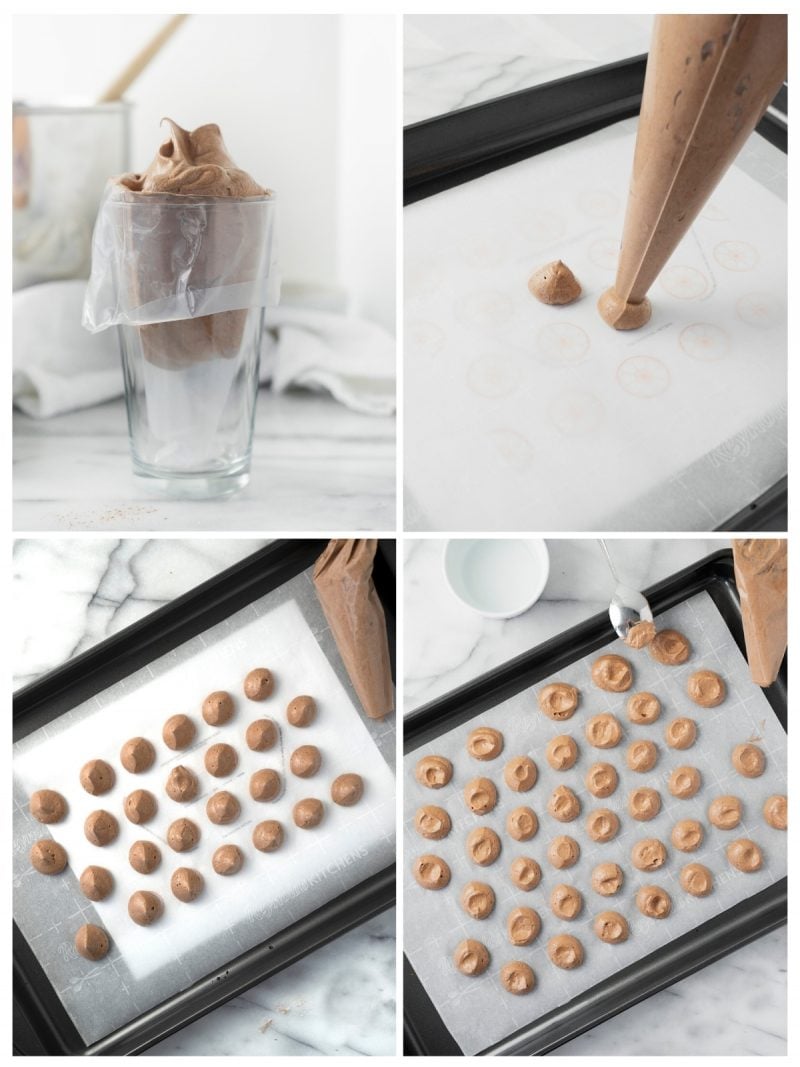 piping mini chocolate pavlovas on a baking sheet