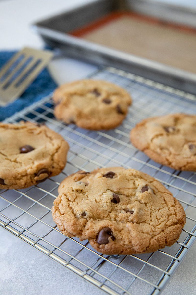 freshly baked air fryer chocolate chip cookies on a wire rack