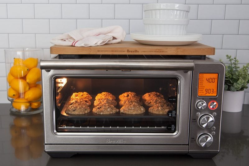 A dozen muffins baking in a Breville Smart Oven Air Fryer.