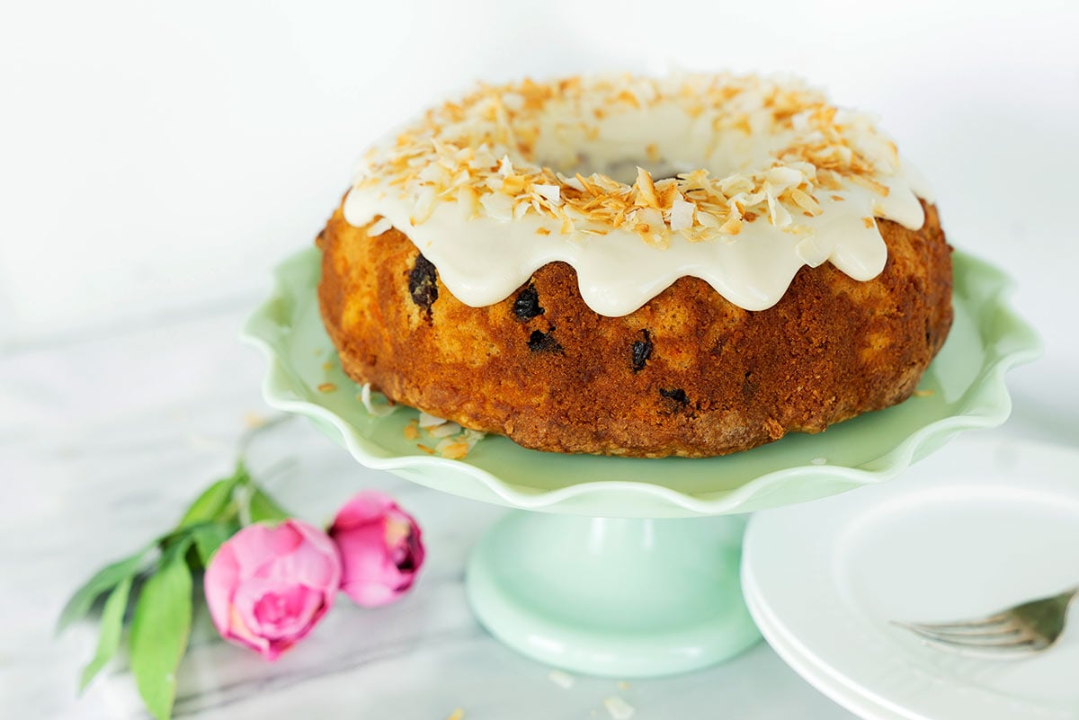 cake stand with pineapple and carrot bundt cake