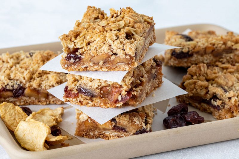 stack of bars with oats, apples, and cherries