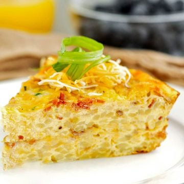 slice of hash brown quiche on a white plate