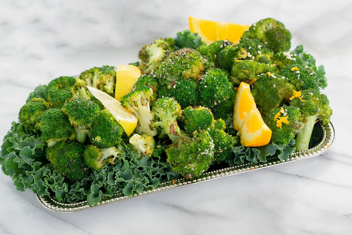 plate of crispy broccoli with lemon