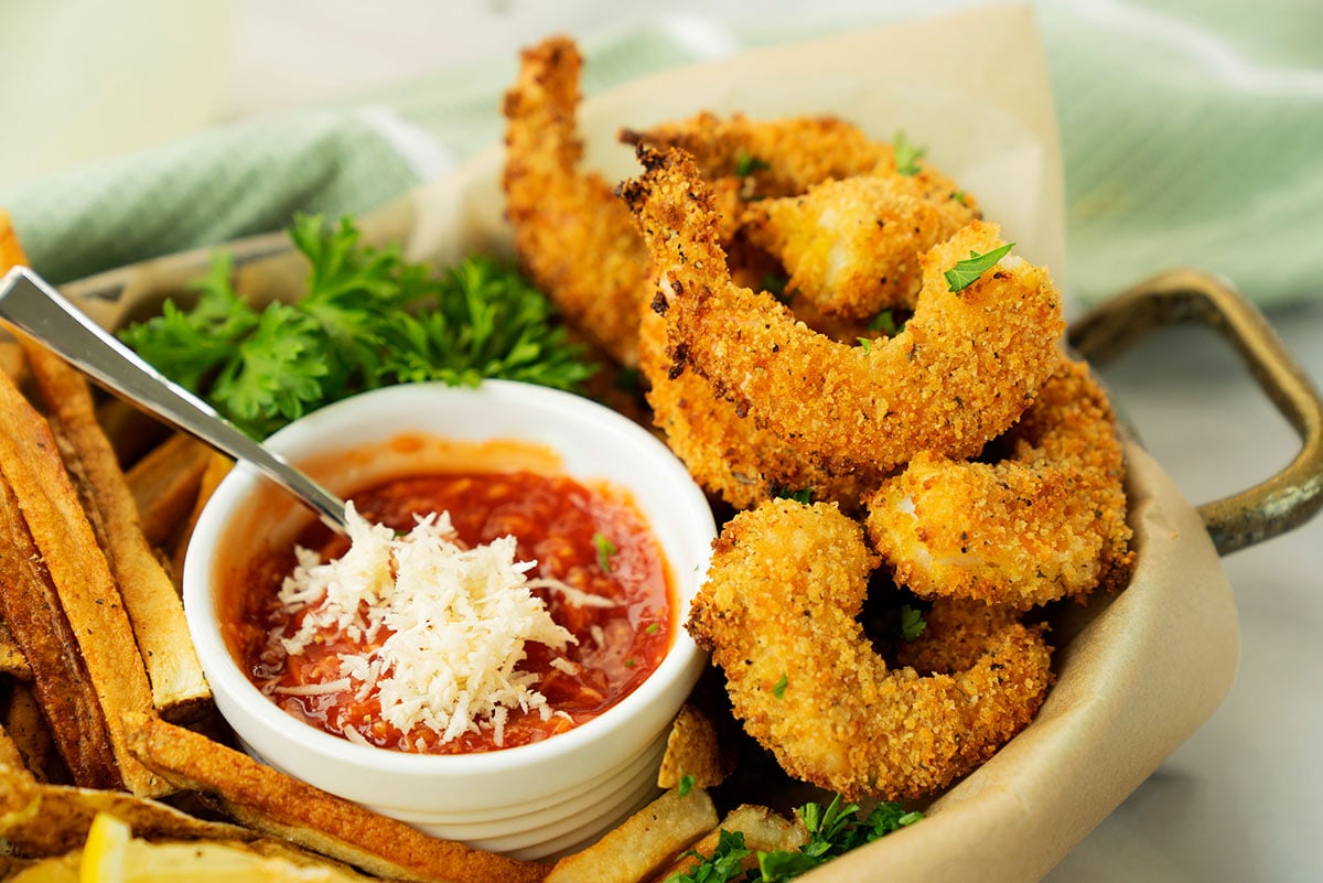 plate of air fryer shrimp with dipping sauce