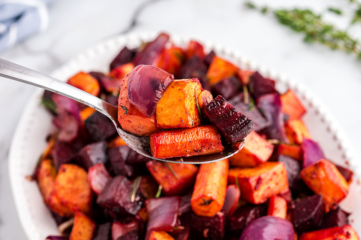 plate of roasted beets, carrots and sweet potatoes