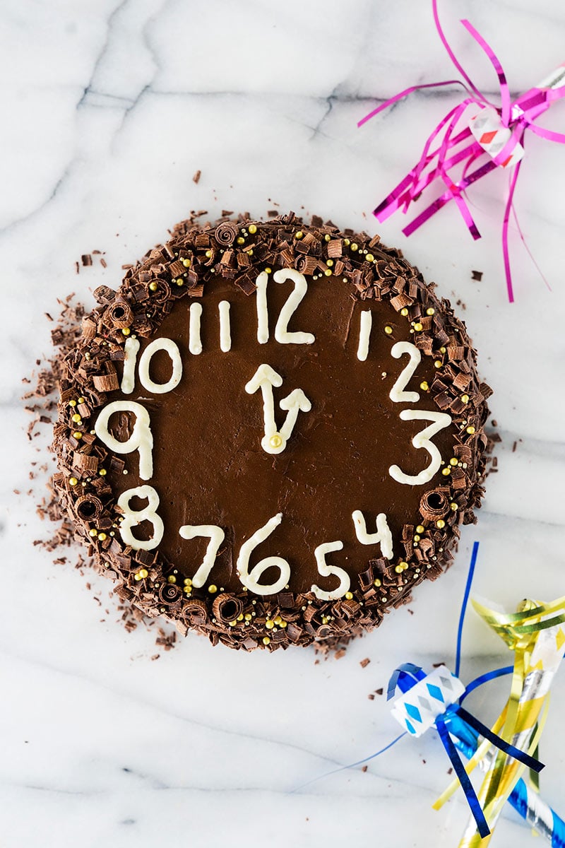 cake decorated with a clock for new year's