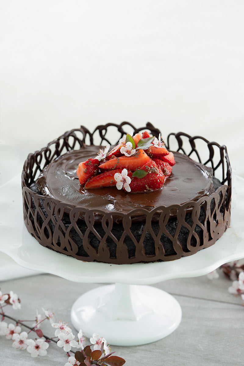 decorated chocolate cake with lace collar