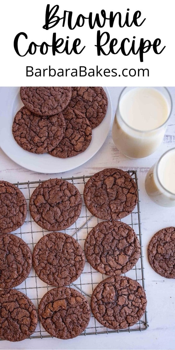 pin that reads "brownie cookie recipe" with chocolate cracked thin cookies on a cooling rack with a glass of milk
