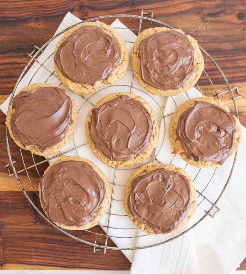 peanut butter nutella cookies on a circle cooling rack