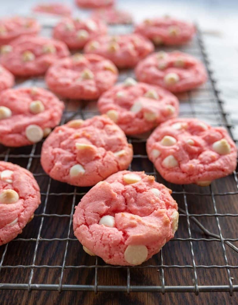 Top view of strawberry cookies on a cooling rack.