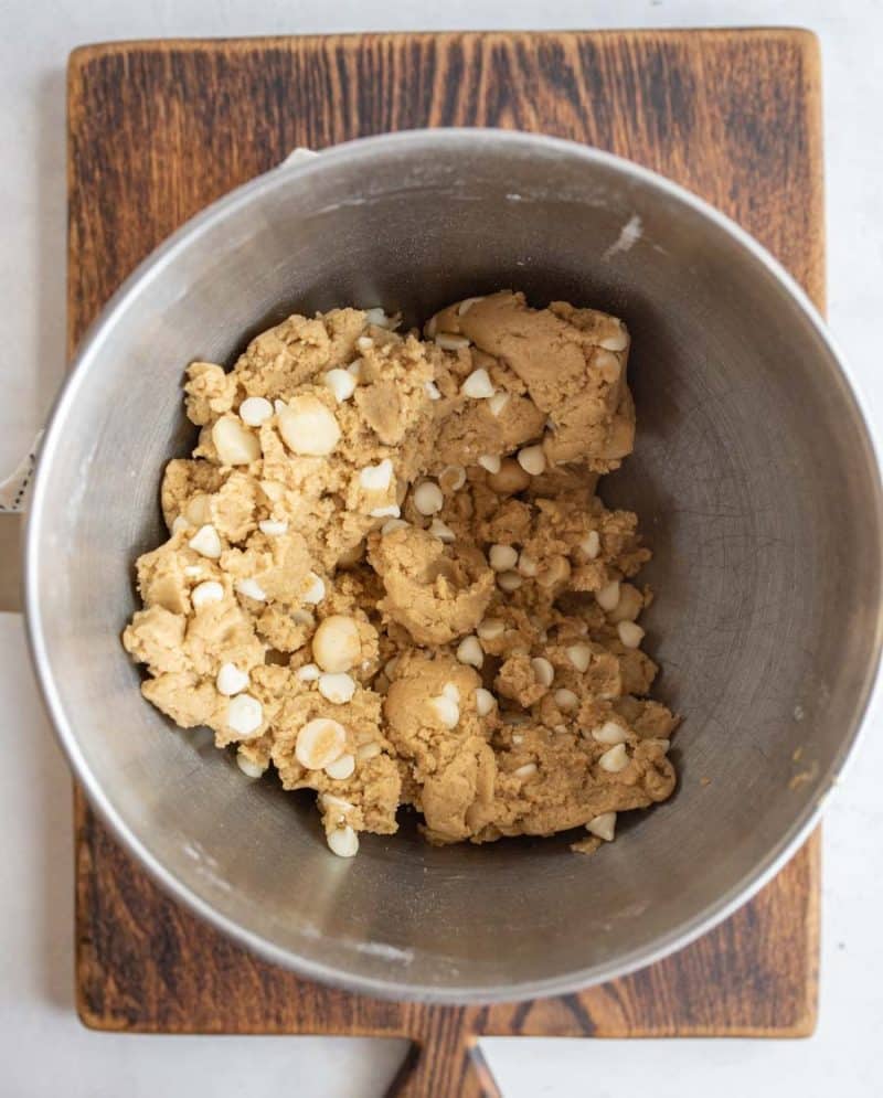 white chocolate macadamia nut cookie dough in mixing bowl