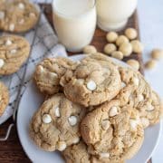 stack of white chocolate macadamia nut cookies on a plate