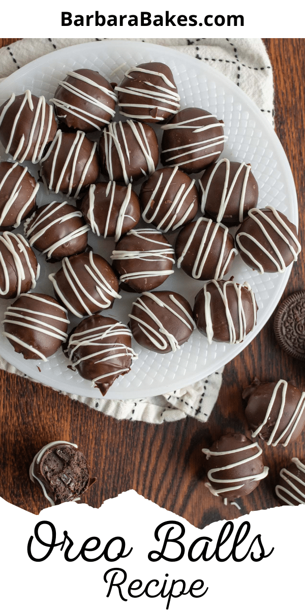 Oreo balls are heavenly bites of crushed Oreos and cream cheese dipped in chocolate. Sure to be a crowd pleaser! via @barbarabakes