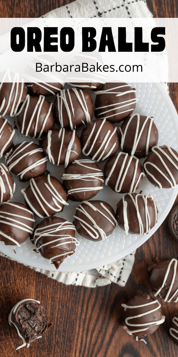 Oreo balls are heavenly bites of crushed Oreos and cream cheese dipped in chocolate. Sure to be a crowd pleaser! via @barbarabakes