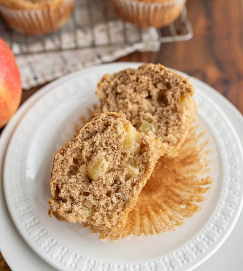 Apple cinnamon muffin served on a plate. 