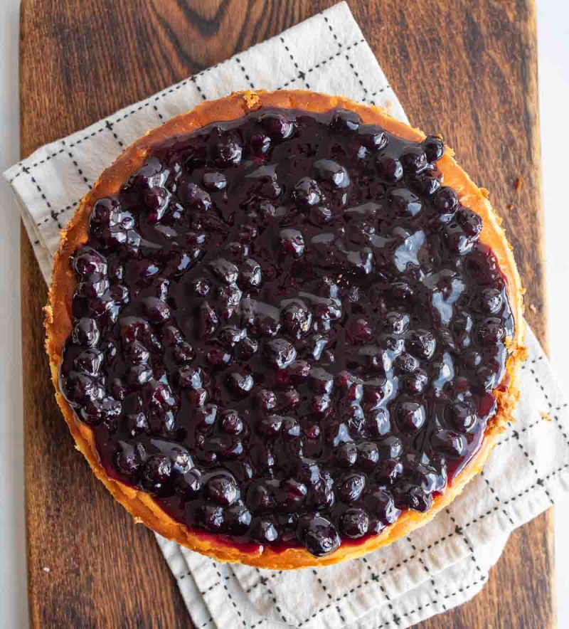 Top view of a full blueberry cheesecake.