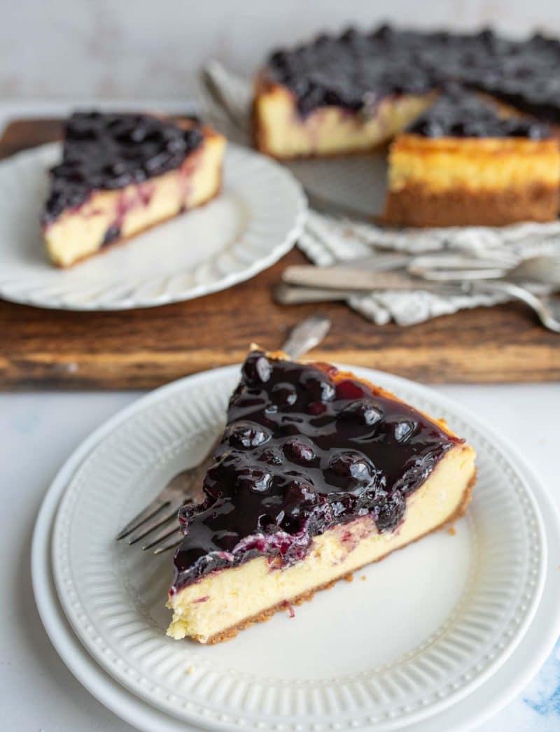 Slice of blueberry cheesecake.