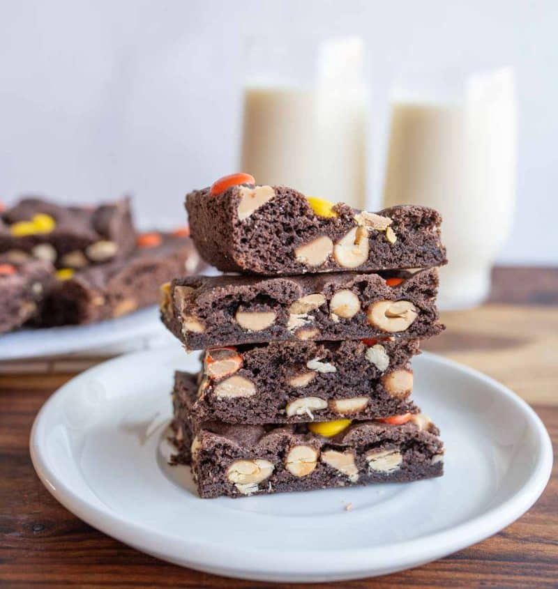 Stack of chocolate cake bars with milk.