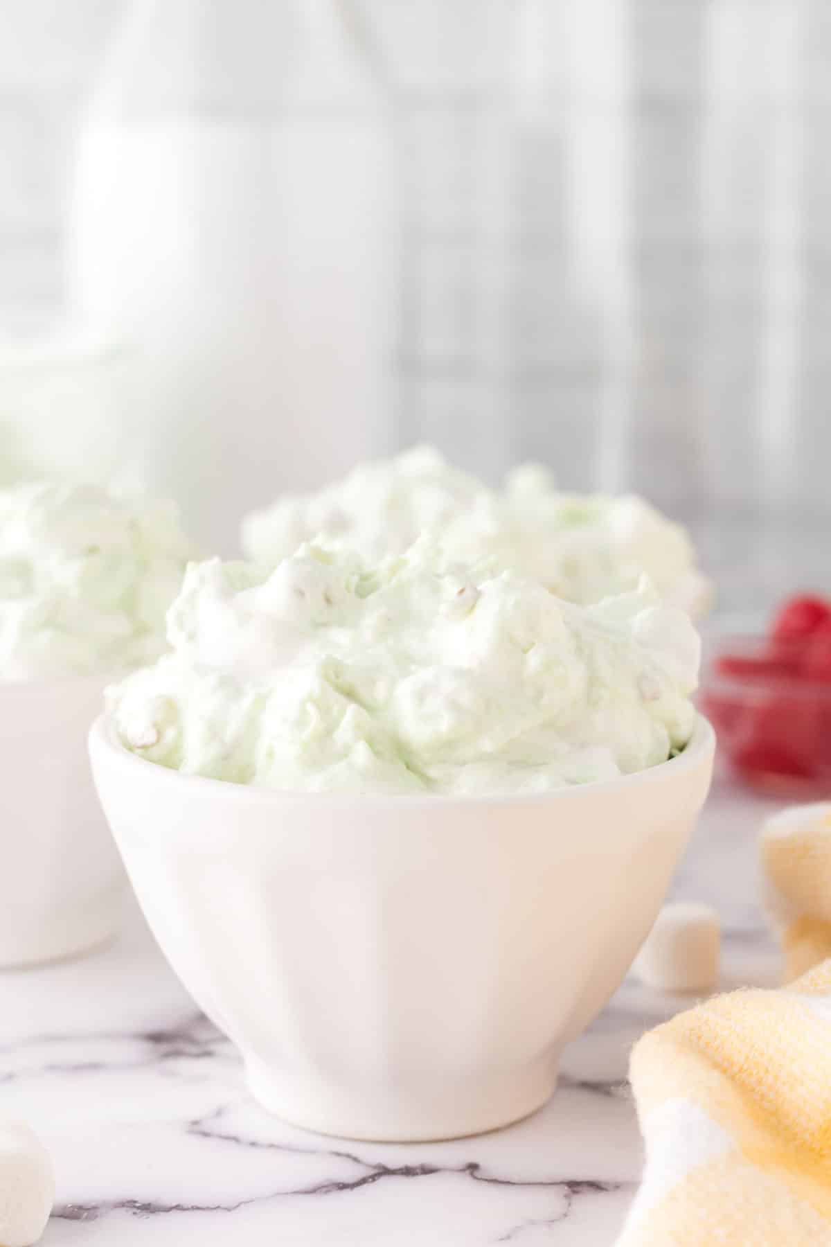 small portion bowls of pistachio jello salad