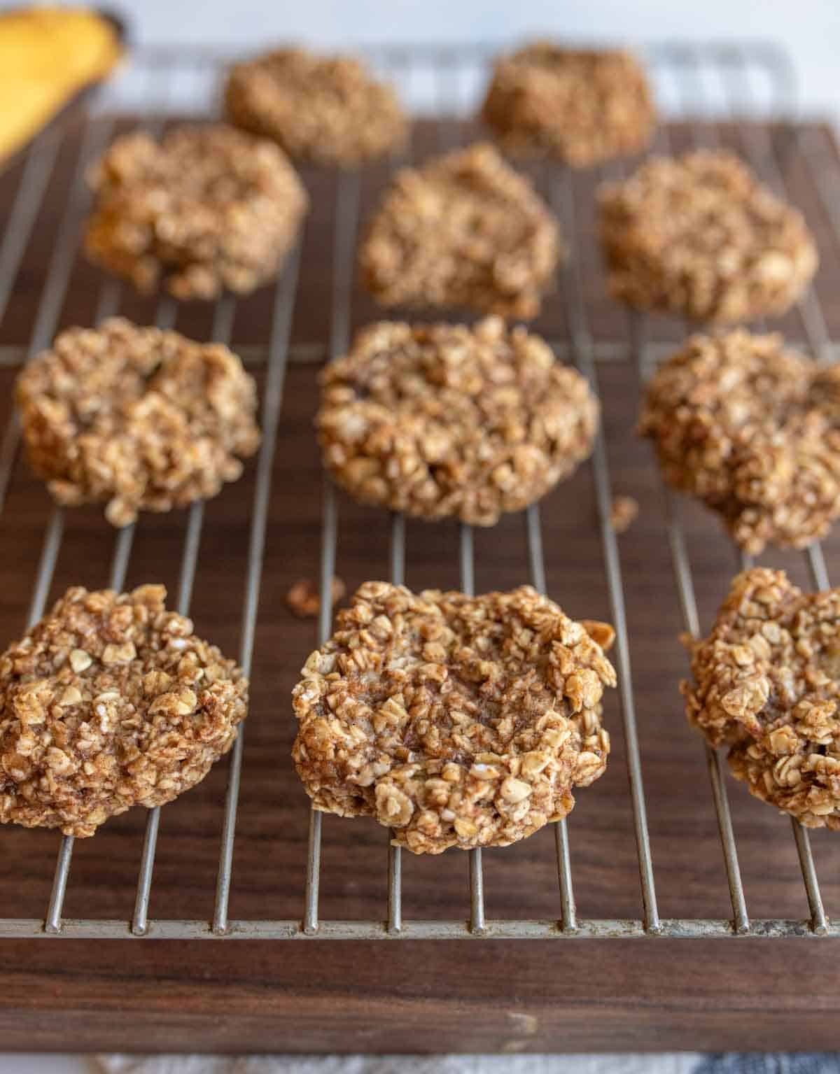 banana oatmeal cookies lined on a cooling rack