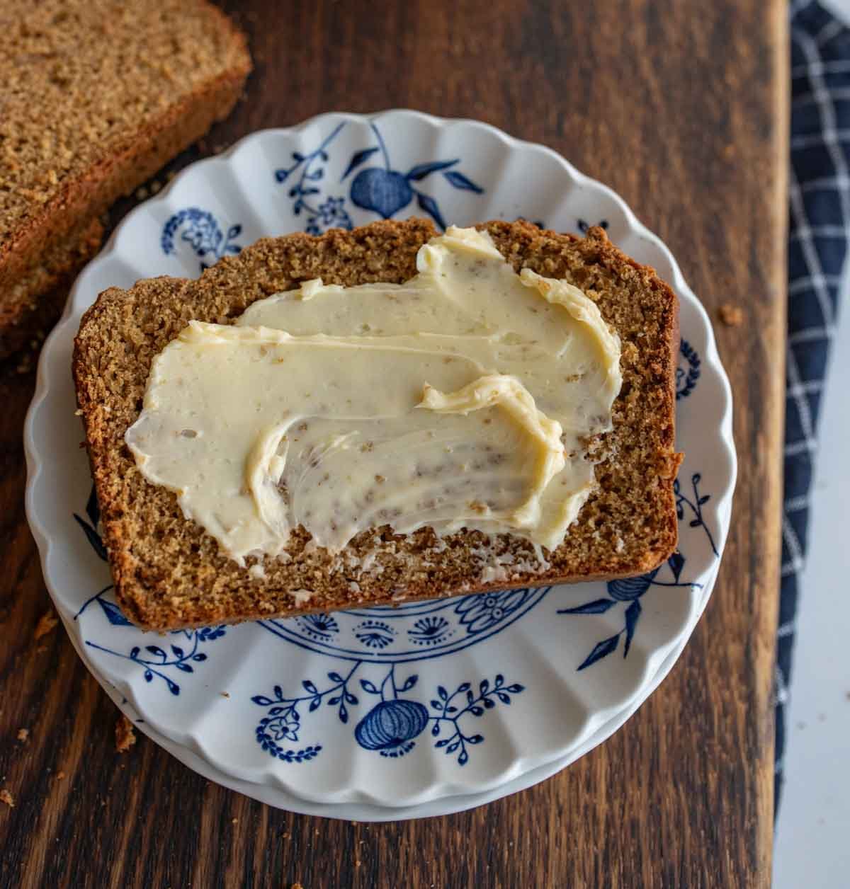 soda bread slice on a plate with butter on top