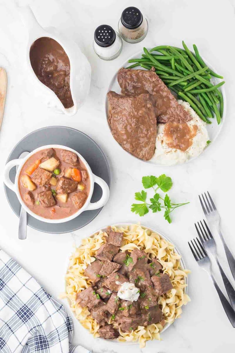 top aesthetic view of three meals prepared with round steak - round steak beef stew, round steak over noodles, and round steak with gravy dinner with green beans and mashed potatoes